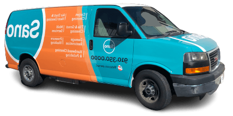 Sano Steam branded service van showing driver side with teal and orange wrap design and Sano Steam logo